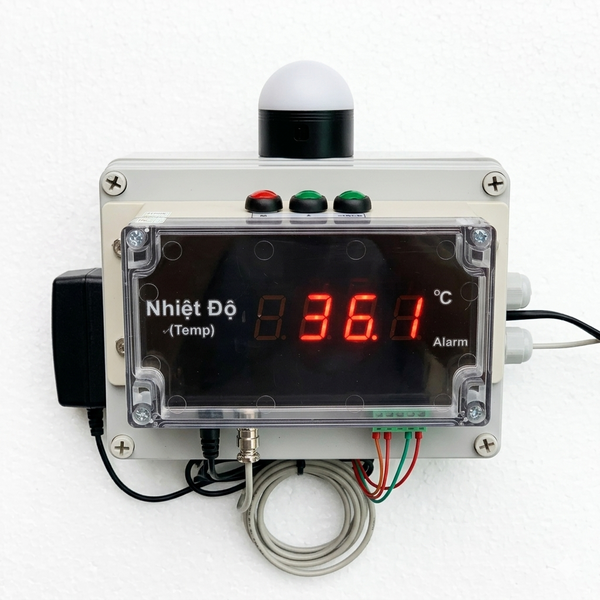 Temperature monitoring device with digital display on a white background