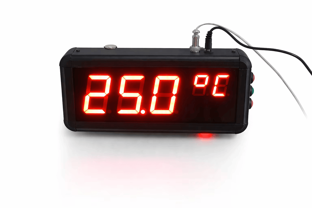 Digital thermometer with red LED display on a white background