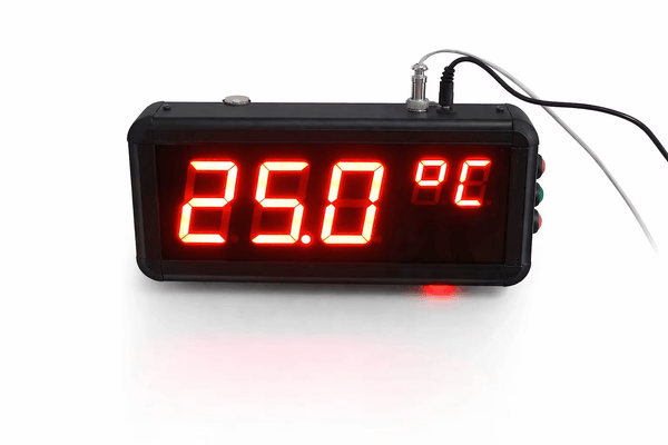 Digital thermometer with red LED display on a white background