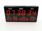 Digital clock with red LED display on a white background