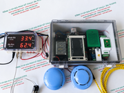 Electronic device with temperature and humidity sensors on a printed paper background