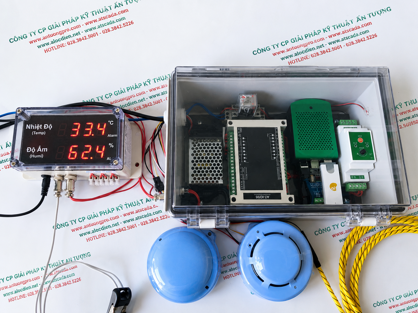 Electronic device with temperature and humidity sensors on a printed paper background