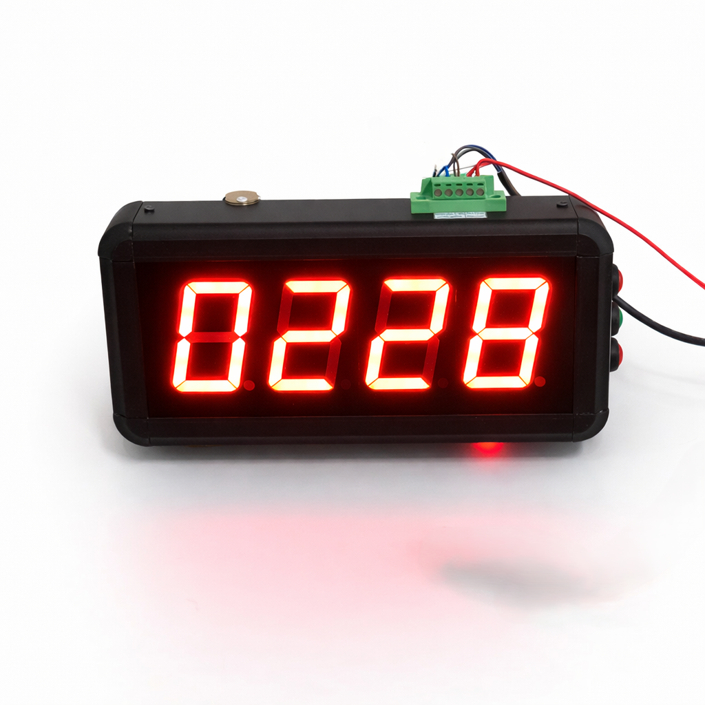 Digital clock with red LED display on a white background