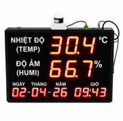 Digital temperature and humidity monitor with LED display on a white background