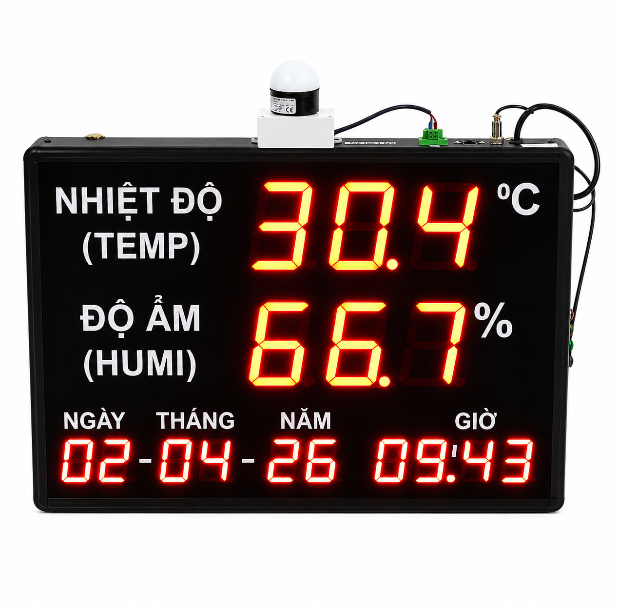 Digital temperature and humidity monitor with LED display on a white background