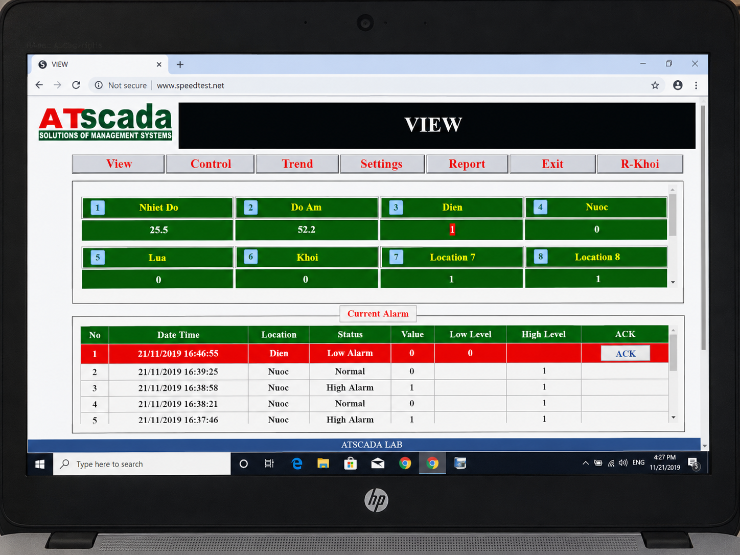 ATscada software interface on a computer screen with HP branding.