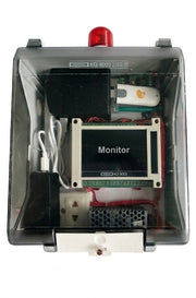 Electronic device with a monitor, power cable, and red light on a white background