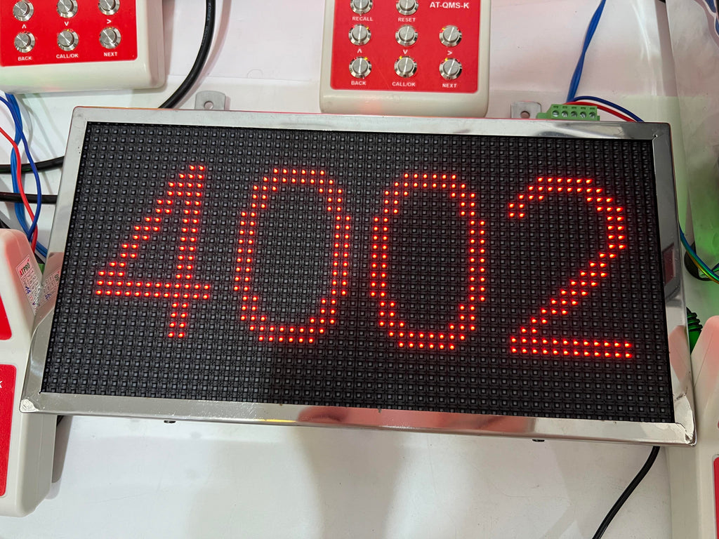 LED display showing the number '4002' on a white background with electronic components.